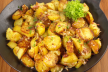 Gebakken aardappels met spek en uien recept